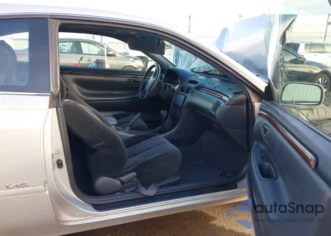 2001 Toyota Camry Solara Se V6 z USA, uszkodzony, nr VIN 2T1CF22P31C520699